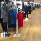 Clothes rail display stand with straight or sloping arms