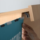 Easily add a poster using the integrated poster gripper